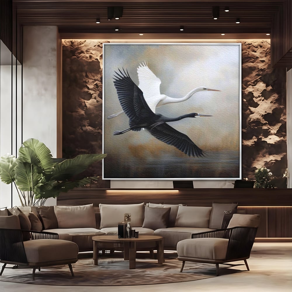 Tablou canvas cu tablou canvas cu doua pasari in zbor, in rama de aluminiu argintiu, pe perete intr-un birou